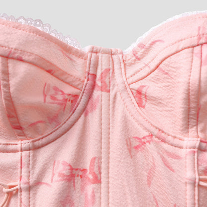Side view of pink lace-up detail with sculpted paneling – Bare Horizon